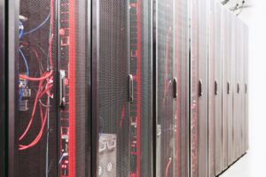 Modern data server room with network racks and cables