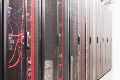 Modern data server room with network racks and cables
