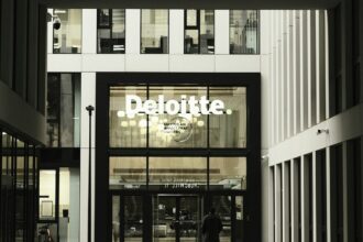 Entrance of Deloitte office in urban setting
