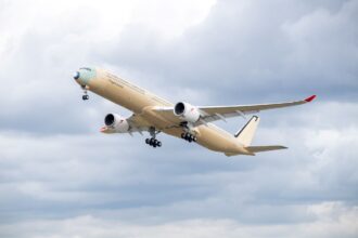 Qantas A350-1000 flying through clouds on first flight.