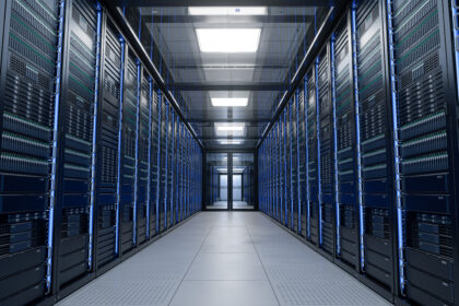 Modern data centre with rows of server racks in a climate-controlled server room.