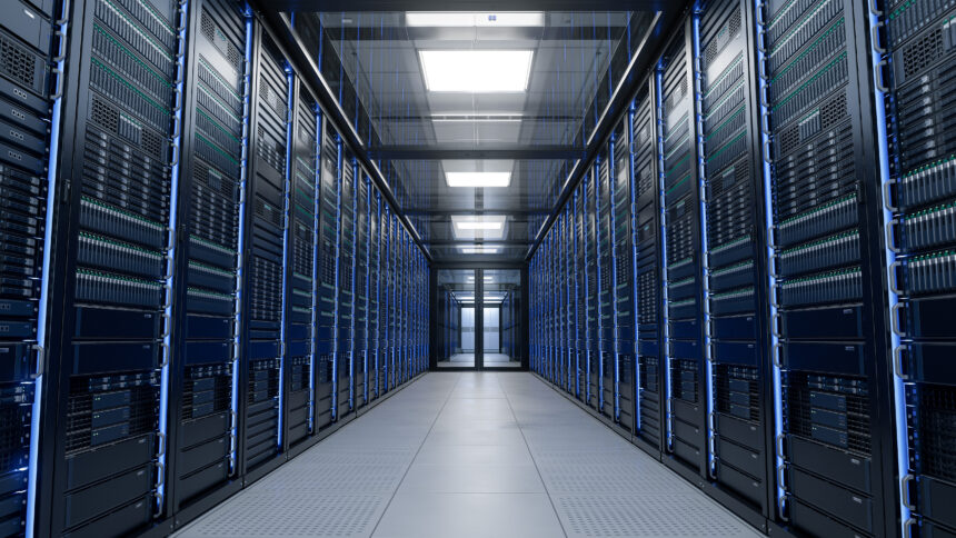 Modern data centre with rows of server racks in a climate-controlled server room.