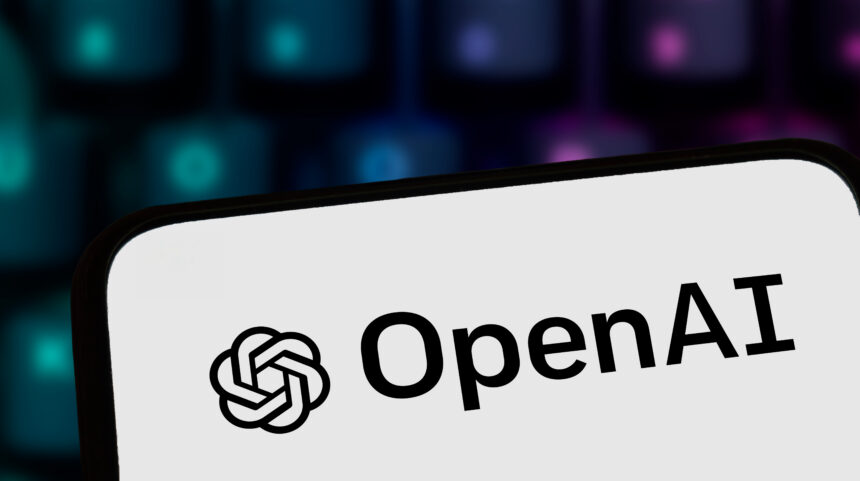 Close-up of a smartphone screen displaying the OpenAI logo.