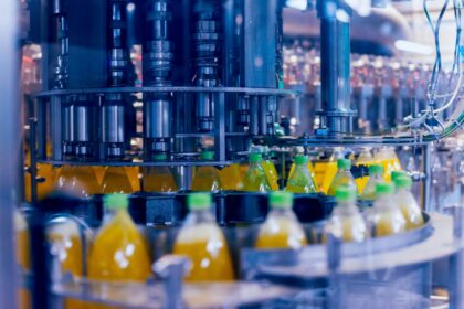 Bottled drinks on a manufacturing conveyor.
